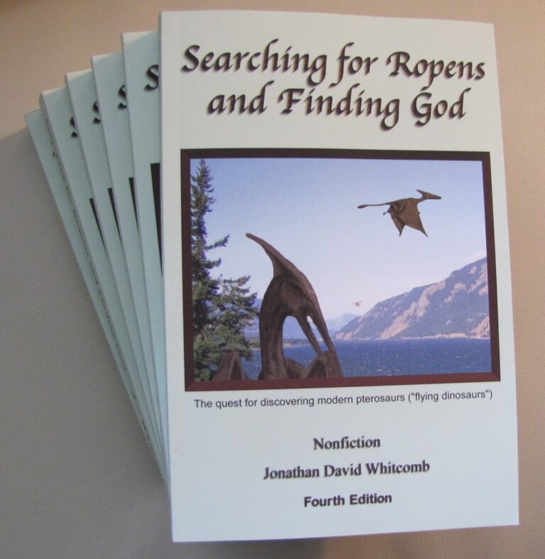 pile of paperback books - "Searching for Ropens and Finding God"
